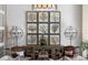 Elegant living room with unique wall art, stylish lighting, and comfortable seating at 8434 Dunham Station Dr, Tampa, FL 33647