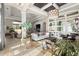 Spacious living room with high ceilings, large windows, stylish furnishings, and elegant decor at 8434 Dunham Station Dr, Tampa, FL 33647