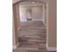 Hallway featuring decorative archways and hard surface flooring at 10116 N Highland Ave, Tampa, FL 33612