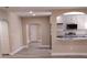 Open-concept living area showcasing modern finishes and easy access to kitchen at 10116 N Highland Ave, Tampa, FL 33612