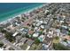Aerial view of the property highlighting its proximity to the ocean and surrounding neighborhood at 110 8Th St, Belleair Beach, FL 33786