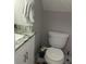 Cozy bathroom has a new toilet and lots of storage at 11727 Spanish Lake Dr, Tampa, FL 33635