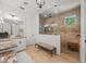 Lavish bathroom with large glass shower, tile accents, and modern fixtures at 124 Estado Ne Way, St Petersburg, FL 33704