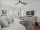 Calming bedroom with plush bedding, chic decor, and serene natural light creates a cozy and inviting atmosphere at 124 Estado Ne Way, St Petersburg, FL 33704