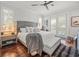 Bright bedroom featuring a king bed, ample windows, and stylish decor, creating a serene retreat at 124 Estado Ne Way, St Petersburg, FL 33704