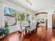 Dining room with backyard views and hardwood floors at 124 Estado Ne Way, St Petersburg, FL 33704