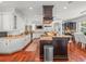 Spacious kitchen with stainless steel appliances, large island, and ample cabinet space at 124 Estado Ne Way, St Petersburg, FL 33704
