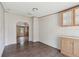 Dining room with wood-look flooring and built-in cabinets at 12502 Tocci Ln, Riverview, FL 33579