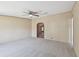 Inviting living room with neutral walls, ceiling fan and plush carpet for a cozy atmosphere at 12502 Tocci Ln, Riverview, FL 33579