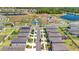 Neighborhood aerial view showcasing parks, playground, and serene lakes at 12950 Pasture Woods Pl, Lithia, FL 33547
