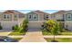 Charming two-story home with well-manicured lawn and a two car garage at 12950 Pasture Woods Pl, Lithia, FL 33547