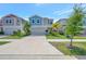 Charming two-story home with well-manicured lawn and a two car garage at 12950 Pasture Woods Pl, Lithia, FL 33547