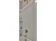 Updated shower features a shower head, shelves, and a single-handle faucet at 12950 Pasture Woods Pl, Lithia, FL 33547