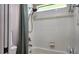 Bathroom with a shower and a dark green shower curtain at 13653 Artesa Bell Dr, Riverview, FL 33579