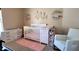 Adorable Bedroom featuring white baby furniture and decor at 13653 Artesa Bell Dr, Riverview, FL 33579