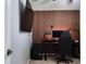 Cozy bedroom with custom wood paneling, perfect for a home office setup at 13653 Artesa Bell Dr, Riverview, FL 33579