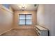 Bright dining room with natural light and modern chandelier at 13653 Artesa Bell Dr, Riverview, FL 33579