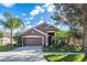 Charming single-Gathering home featuring lush landscaping and a two-car garage at 13653 Artesa Bell Dr, Riverview, FL 33579