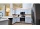 Modern kitchen featuring stainless steel appliances and light blue cabinetry at 13653 Artesa Bell Dr, Riverview, FL 33579