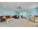 Cozy living room featuring hardwood floors, recessed lighting, and comfortable furniture at 1501 Wisconsin Ave, Palm Harbor, FL 34683