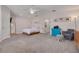 Spacious main bedroom with carpeting, ensuite bathroom, and a vaulted ceiling at 1501 Wisconsin Ave, Palm Harbor, FL 34683