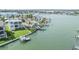 Scenic community with waterfront homes, private docks, and boats, offering a desirable coastal lifestyle at 16025 Redington Dr, Redington Beach, FL 33708