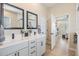 Bathroom features dual sinks, modern fixtures, and plenty of storage and counter space at 16025 Redington Dr, Redington Beach, FL 33708
