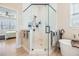 Bathroom features glass shower, soaking tub, and modern fixtures at 16025 Redington Dr, Redington Beach, FL 33708