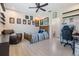Fun bedroom includes decor and gaming setup, ceiling fan and unique modern flooring at 16025 Redington Dr, Redington Beach, FL 33708