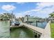 A private boat lift and dock providing convenient access to the water for boating and recreational activities at 16025 Redington Dr, Redington Beach, FL 33708