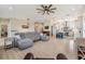 Spacious open floorplan features living area, kitchen with island, and dining area at 16025 Redington Dr, Redington Beach, FL 33708