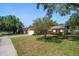 Landscaped yard with charming single-story home, offering great curb appeal at 1632 St Catherine E Dr, Dunedin, FL 34698