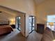 View of bedroom leading to a private screened in patio at 1693 Fry Ct, Dunedin, FL 34698
