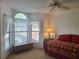 Bedroom featuring a large window with lots of natural light at 1693 Fry Ct, Dunedin, FL 34698