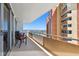 Condo balcony with outdoor seating and views of the city and ocean at 17920 Gulf Blvd # 1302, Redington Shores, FL 33708