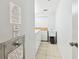 The utility room with a sink, trash chute and laundry machines provides added convenience at 17920 Gulf Blvd # 1302, Redington Shores, FL 33708