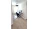This bedroom is light and airy, featuring a height-adjustable desk and an ergonomic office chair at 1853 Hovenweep Rd, Wesley Chapel, FL 33543