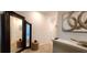 Upstairs hallway features decorative mirrors and wall art at 1853 Hovenweep Rd, Wesley Chapel, FL 33543