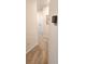 Upstairs hallway with a thermostat at 1853 Hovenweep Rd, Wesley Chapel, FL 33543