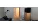 This hallway has a neutral color palette, connecting various rooms at 1853 Hovenweep Rd, Wesley Chapel, FL 33543