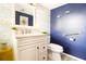 Modern bathroom featuring a vanity with a sink, toilet, and a grab bar for accessibility at 2101 Sunset Point Rd # 1806, Clearwater, FL 33765