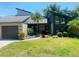 Charming single Gathering home featuring well-kept lawn and mature landscaping at 2101 Sunset Point Rd # 1806, Clearwater, FL 33765