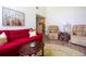Spacious living room featuring comfortable seating and a stylish decor, perfect for relaxation and entertaining guests at 2101 Sunset Point Rd # 1806, Clearwater, FL 33765
