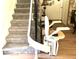 Stairway features a chair lift for easy access at 2101 Sunset Point Rd # 1806, Clearwater, FL 33765
