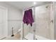 Beautiful bathroom featuring a glass door shower with tile surround, and neutral paint at 2529 Arbor Wind Dr, Lutz, FL 33558