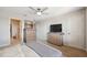 Cozy bedroom with soft carpet, a ceiling fan, and two dressers for storage at 2529 Arbor Wind Dr, Lutz, FL 33558
