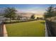 Community dog park with artificial turf and secure fencing offers a safe and enjoyable space for pet owners at 2529 Arbor Wind Dr, Lutz, FL 33558