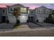 Charming townhomes feature a paved driveway and attached one-car garages at 2529 Arbor Wind Dr, Lutz, FL 33558