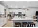 Bright kitchen features a center island with bar stool seating at 2529 Arbor Wind Dr, Lutz, FL 33558