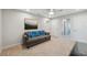 Inviting living room with a neutral color palette and soft carpeting at 2529 Arbor Wind Dr, Lutz, FL 33558